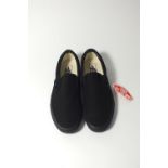 A pair of Vans, classic slip-on, black canvas with black rubber, UK size 9