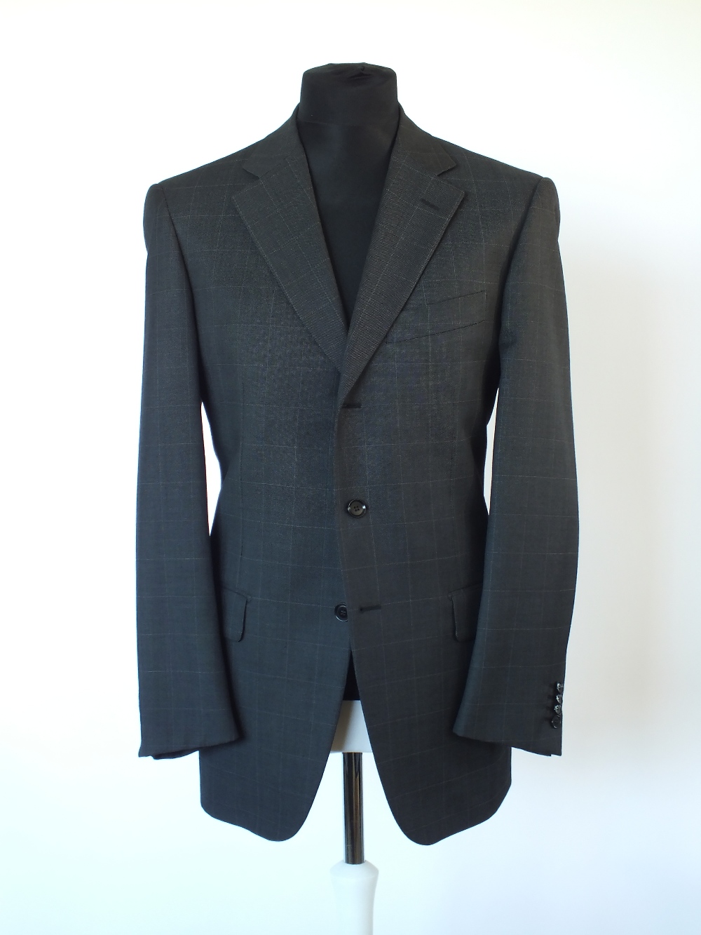 A Gucci suit, navy and mid blue check, single vent, Gucci horse bit woven logo lining, Italian