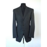 A Gucci suit, navy and mid blue check, single vent, Gucci horse bit woven logo lining, Italian