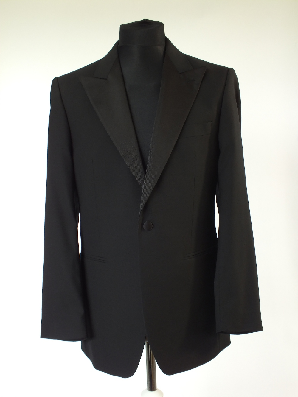 A Charles Tyrwhitt dinner suit, satin twill lower lapel, satin twill detailing, flat front to