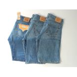 Three Levi 501 jeans, blue, one with tags, 34/34