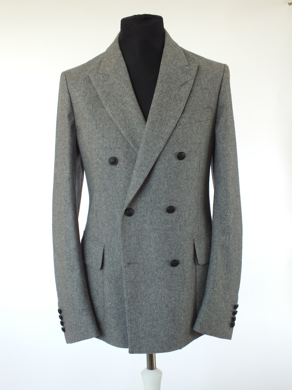 A Gucci suit, grey, half lined, double vent, orange detailing, Italian size 52R, 97% wool, 2%