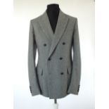 A Gucci suit, grey, half lined, double vent, orange detailing, Italian size 52R, 97% wool, 2%