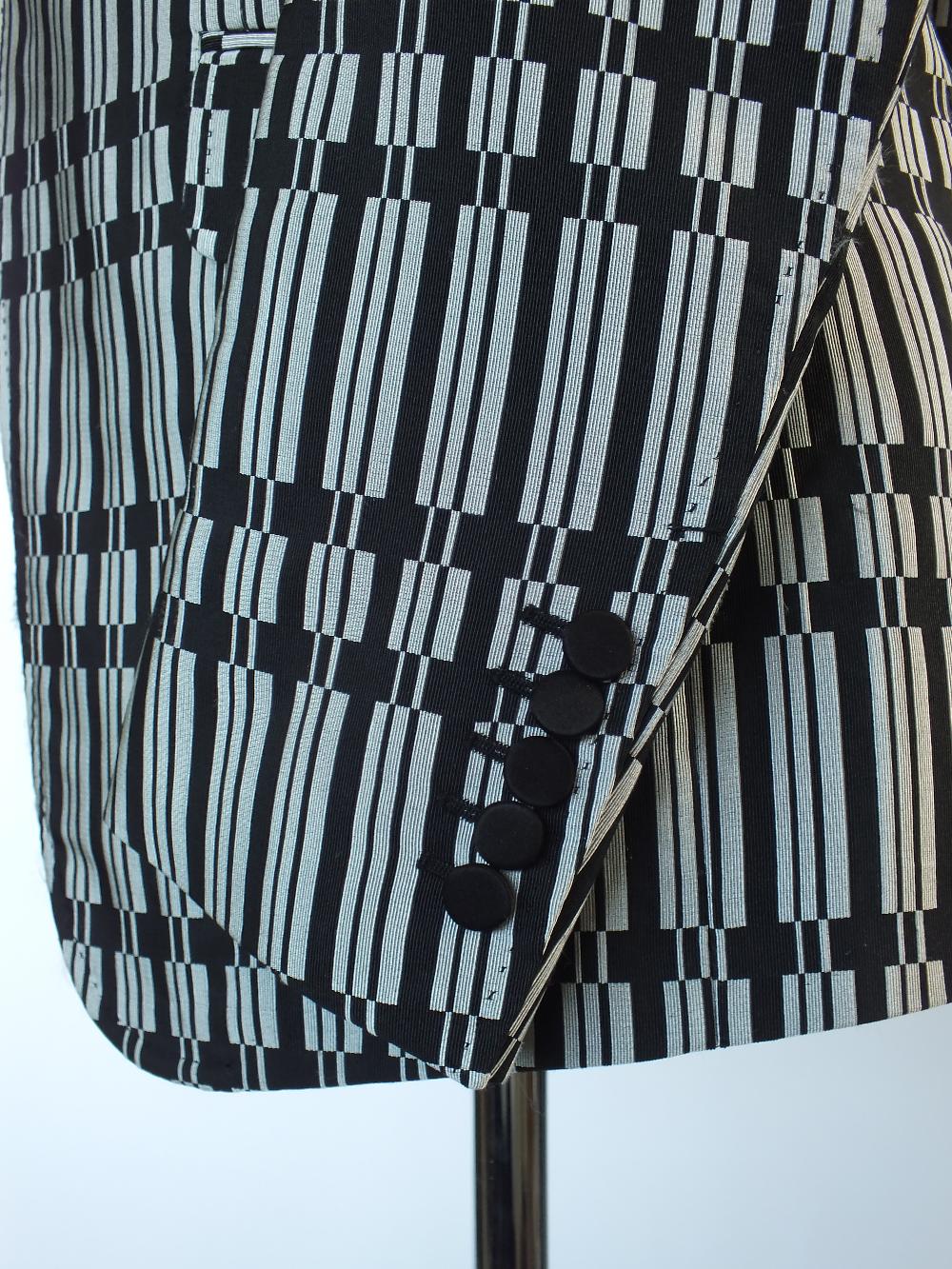 A Gucci dinner suit, black with white patterned fabric, double vented, Italian size 52R, 70% silk, - Image 5 of 5