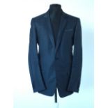 A Gucci dinner jacket, dark blue with blue metallic fine pinstripe, satin upper lapel, satin