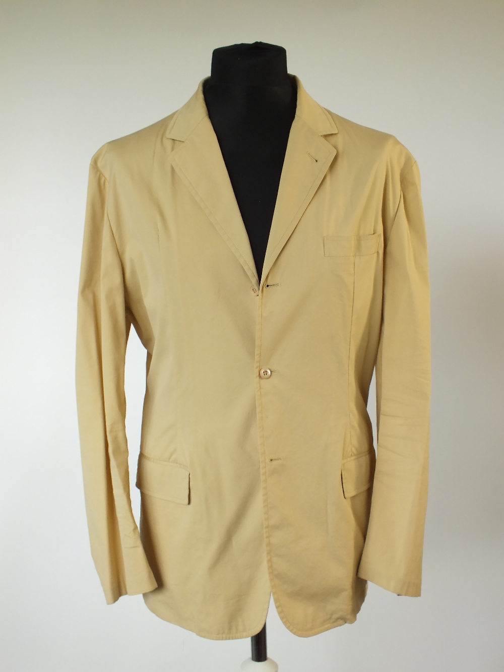 A Prada suit, sand, jacket unlined, 78% cotton, 5% spandex, 17% nylon, flat front to trousers,