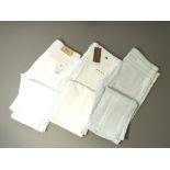 Three Gucci jeans, two white, one plasticised white denim, one white pair brand new with tags,