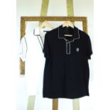 Two Gucci polo shirts, one black, one white, one size L and one size XL