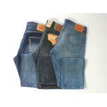 Three pairs of Levi 501 jeans, blue, one with tags, 34/34