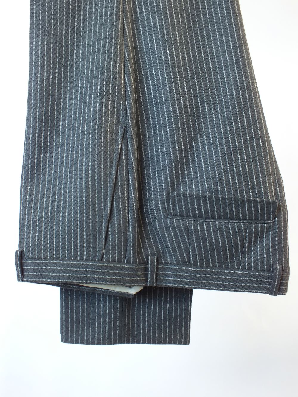 A Gucci three piece suit, grey pinstripe, double vent, Italian size 52R, 100% wool, flat front to - Image 9 of 9