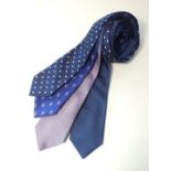 Four ties to include navy with white spot, bright blue with paisley, woven pink and navy, Ferrari