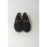 A pair of Gucci loafers, black suede, brass horse bit, UK 8.5, slight signs of wear to sole