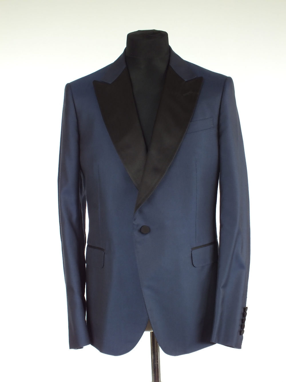 A Gucci dinner jacket, blue with black satin lower lapel and black satin detailing, double vent,