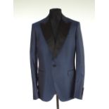 A Gucci dinner jacket, blue with black satin lower lapel and black satin detailing, double vent,