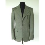 A Gucci jacket, grey, patch pockets with inverted pleat and flap, belt detail to back, single