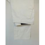 A pair of Gucci trousers, white, flat front, gathered knee detail, Gucci logo to back of