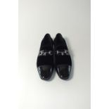 A pair of Gucci slip-on evening shoes, black velvet and patent leather with silver tasselled horse