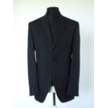 A Dolce & Gabbana suit, black pinstripe, single vent, Italian size 50, 100% wool, flat front to