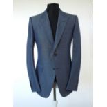 A Gucci suit, blue, brown buttons, single vent, Italian size 52R, 65% cotton, 35% mohair, Gucci