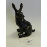 A bronze figure of a hare.