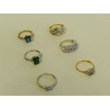 A 9ct white gold tanzanite set ring together with a 9ct gold topaz dress ring and four further 9ct