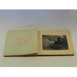 An autograph album with signatures circa 1930s-40s including Charles Laughton, Sybil Thorndyke,