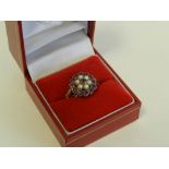 A 9ct gold amethyst seed pearl dress ring