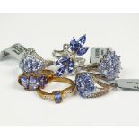 A 9ct white gold tanzanite and diamond cluster ring together with a further tanzanite and diamond