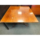 A mahogany rectangular top occasional table on tripod base