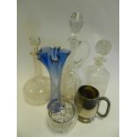 Pressed and cut glasswares including decanters, water jugs, bottles and stoppers,