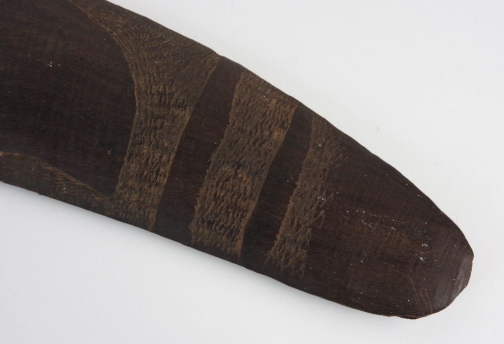 An Australian carved hard wood boomerang the decoration to one side only depicting two emus and a - Image 3 of 10
