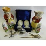 A quantity of white metal cutlery, a spirit flask, a H J Wood salt and pepper cruet set,