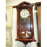 Two modern wood cased Vienna style wall clocks