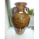 A large Wentford pottery vase by Ara Cardew of amphora shape with four strap handles and incised