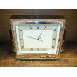 An Edwardian Japanned walnut mantel clock of Art Deco form and decorated with Oriental figures in