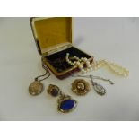 A hard stone set seal fob together with a Victorian locket brooch, an memorial locket,
