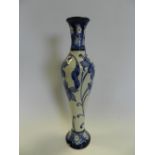 A recent Moorcroft vase decorated with blue flowers and foliage dated 2012 - 31cm high