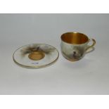 A Royal Worcester cabinet coffee cup and saucer painted with pheasants by James Stinton, signed,