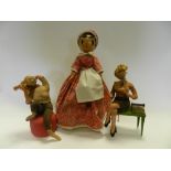 A wooden doll in red dress,