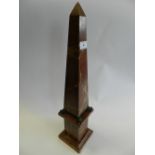 A 19th Century pink veined marble decorative obelisk,