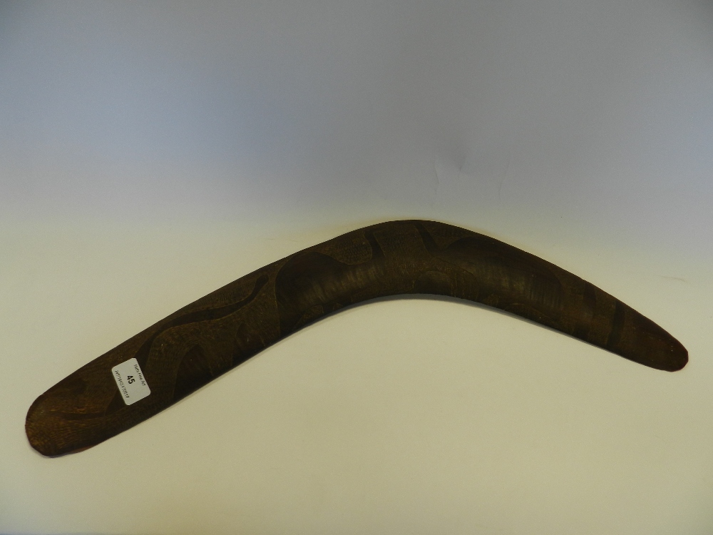 An Australian carved hard wood boomerang the decoration to one side only depicting two emus and a - Image 2 of 10