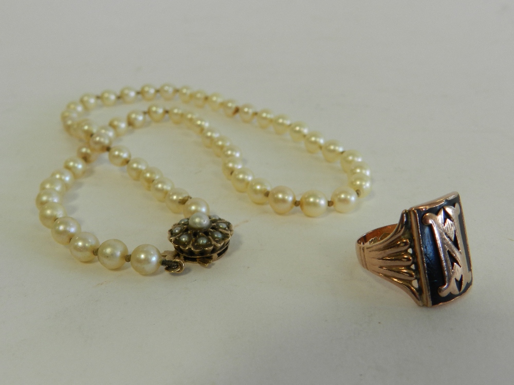 A uniform cultured pearl necklace with seed pearl clasp together with an enamelled signet ring