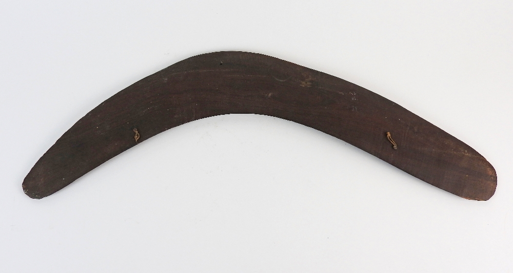 An Australian carved hard wood boomerang the decoration to one side only depicting two emus and a - Image 9 of 10