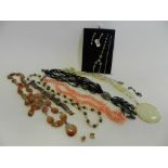 A silver ash tray together with a hardstone set necklace, a stick coral necklace,