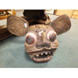A 20th century carved wooden Asian dog of Fo head with pronounced ears