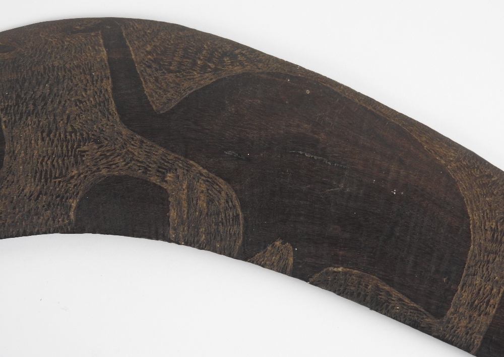 An Australian carved hard wood boomerang the decoration to one side only depicting two emus and a - Image 4 of 10