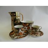 A Royal Crown Derby imari part coffee service including coffee cups, saucer dishes, side plates,