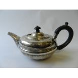 A bachelor's silver tea pot,