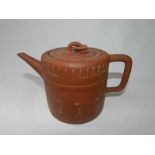 A Chinese redware teapot and cover,