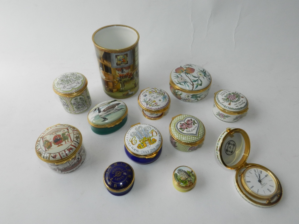 A collection of Halcyon Days enamel pill boxes